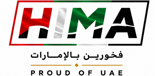 A graphic design featuring the word 'HIMA' in large letters filled with the colors of the UAE flag (red, green, white, and black) inside a slanted rectangular frame. Below it, Arabic text reads 'فخورين بالإمارات' and 'PROUD OF UAE' is written in black capital letters with a small gold diamond accent.